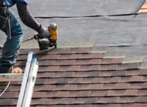 worker doing roof installation